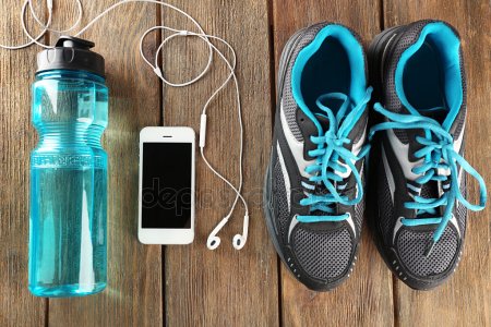 depositphotos 78879304 stock photo sneakers and earphones on wooden1 Fitness Trends