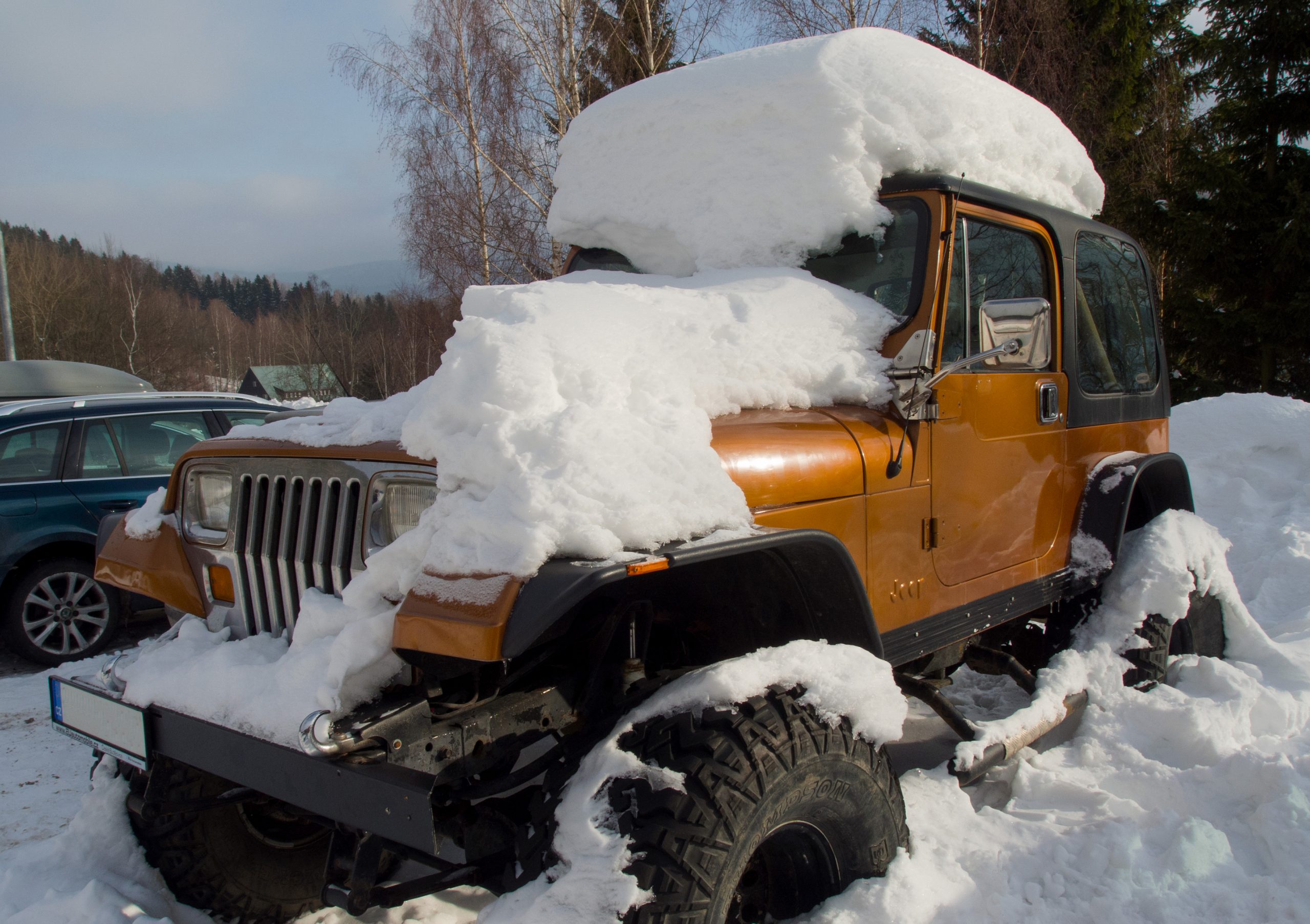 off road jeep car covered witb snow1 scaled Most Expensive Motorbikes